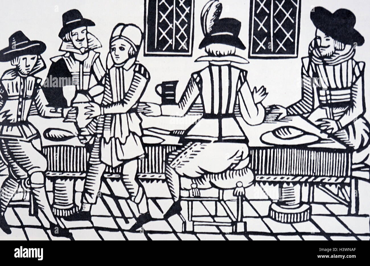 Woodblock stampa di una cena medievale scena. Datato xiv secolo Foto Stock