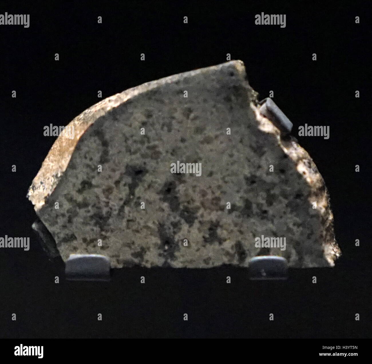 Sezione di un meteorite marziano eiettato fuori Marte in caso di impatto di un asteroide o cometa. Recante la data del XXI secolo Foto Stock