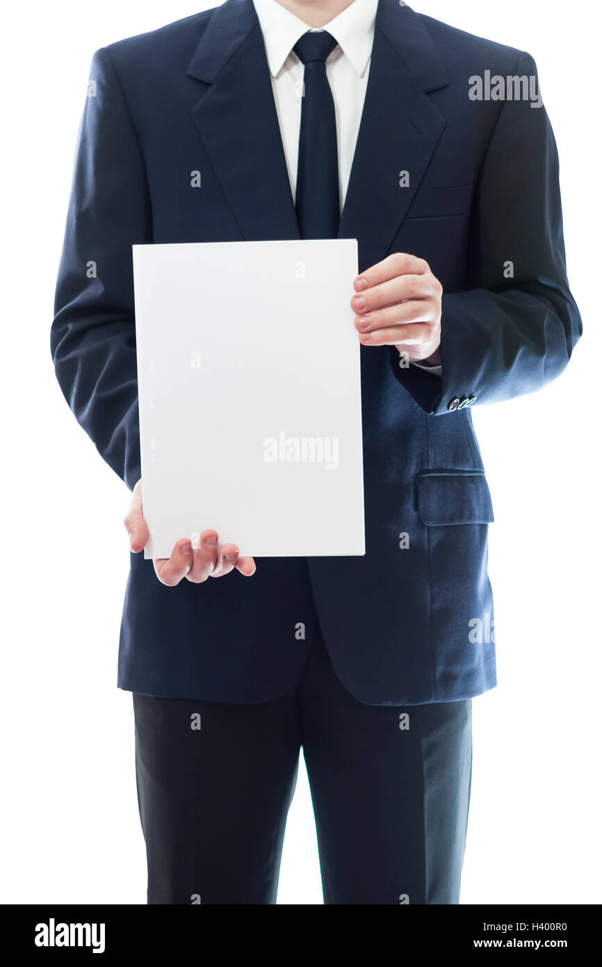Imprenditore tenendo un pezzo di carta bianco con spazio vuoto per la pubblicità o le informazioni Foto Stock