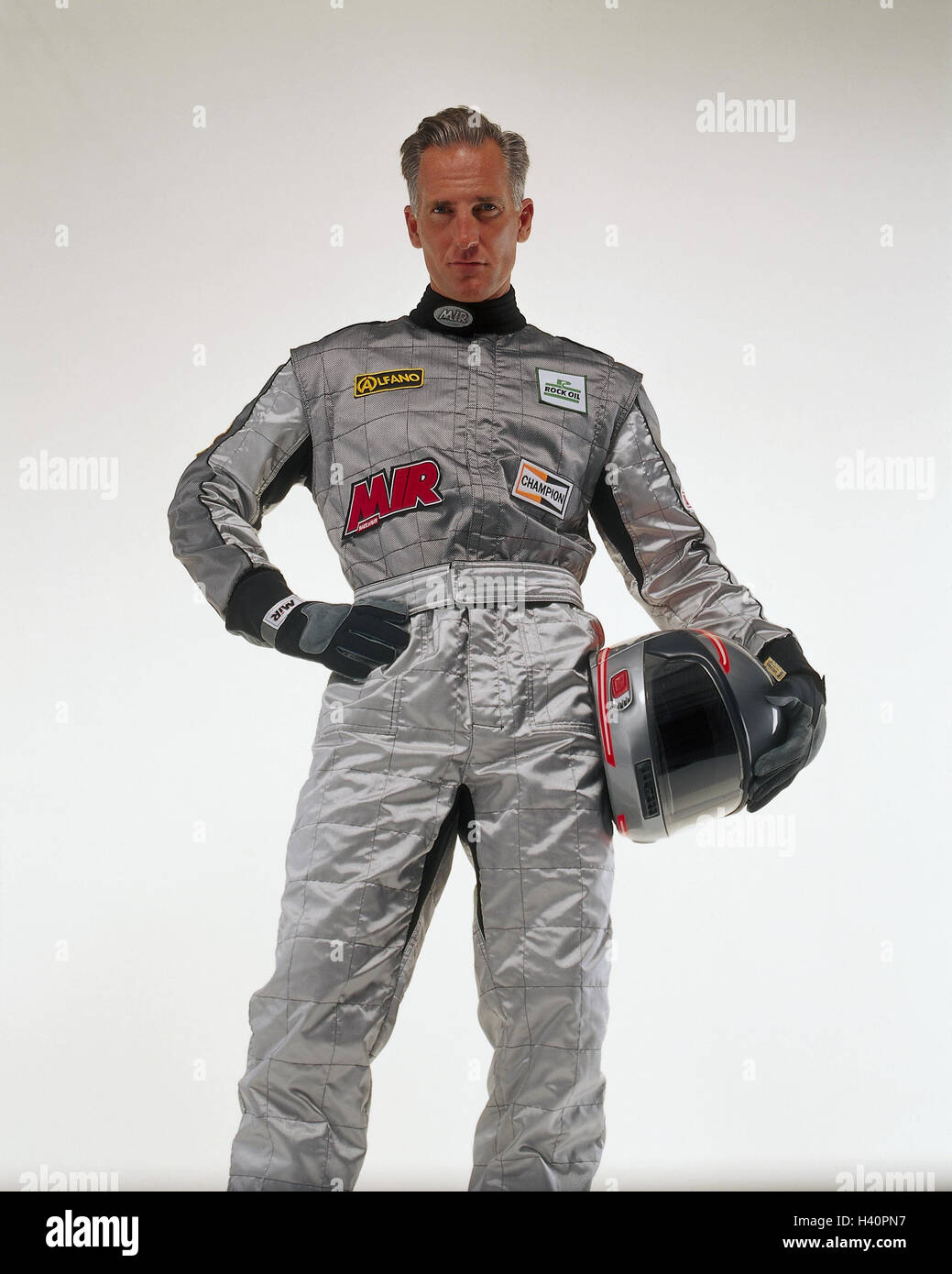 Motor Sport racing driver, complessivamente, casco, silver sport, sport racing, uomo racing tuta, casco, casco, elmetto, guanti, stand, incurante, casualmente, raffreddare, studio Foto Stock
