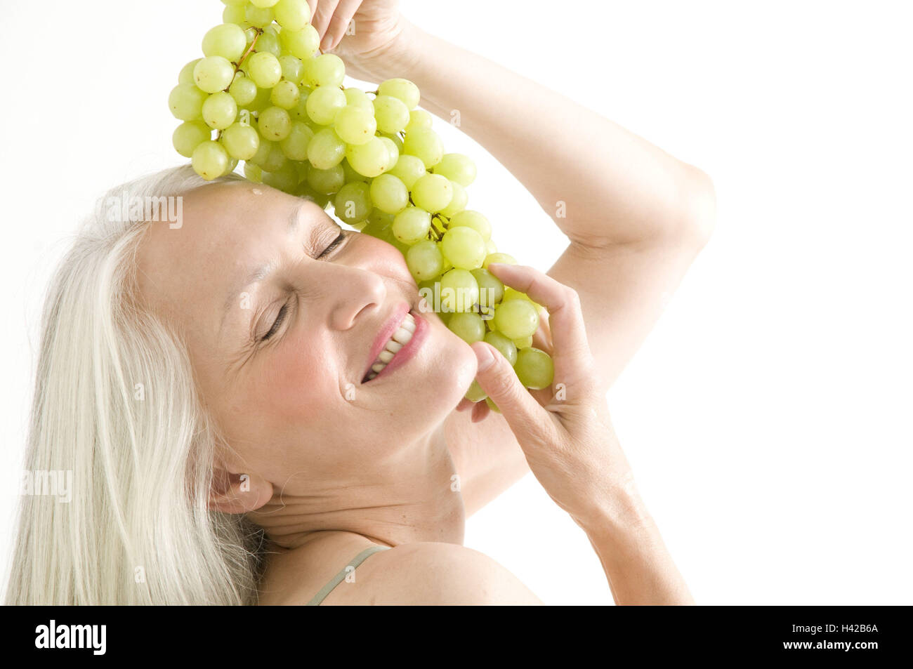 Donna, migliore età, tenere uve, ritratto, Foto Stock