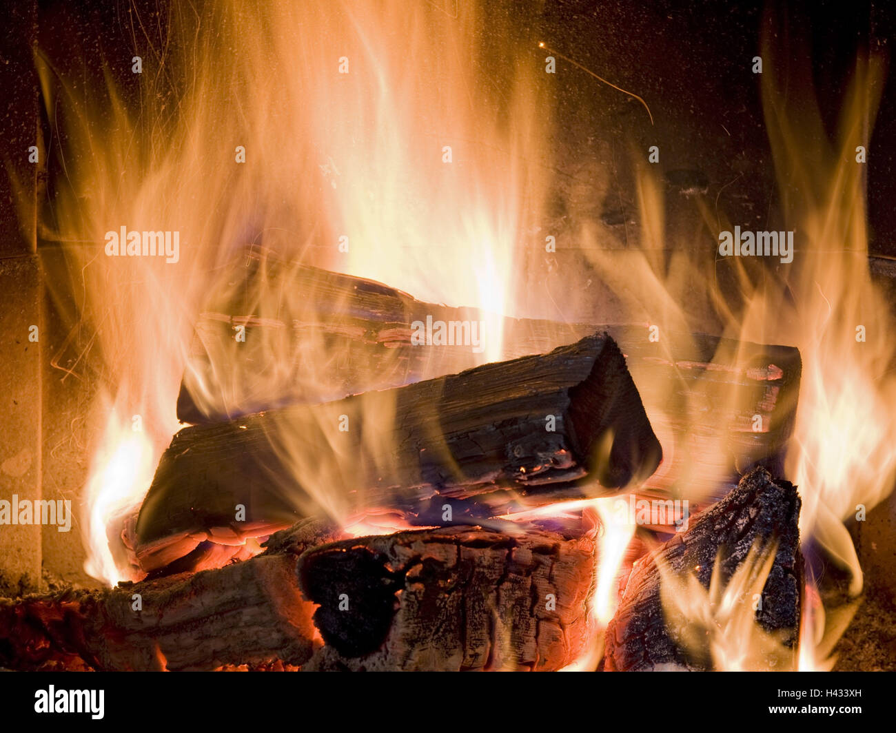 Fuoco di legno, fiamme, glow Foto Stock