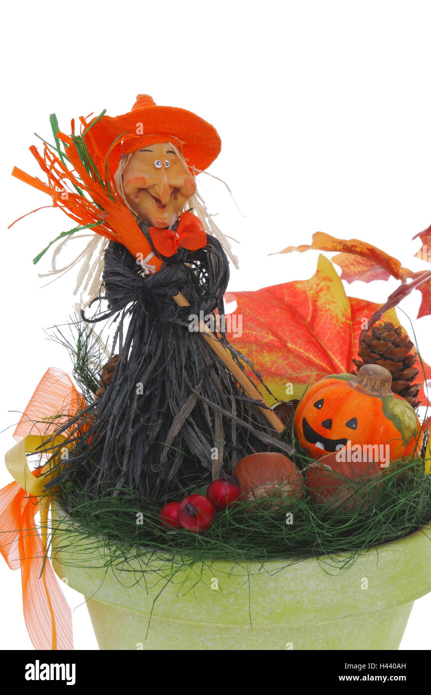Decorazione Halloween, vaso, strega, fogliame autunnale, zucca, dettaglio Foto Stock
