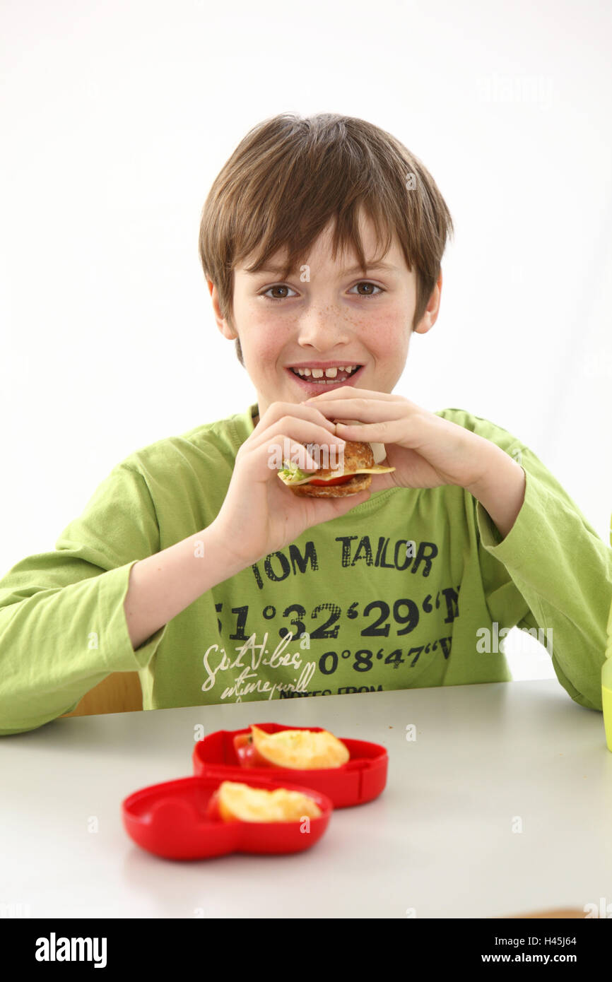 Ragazzo, scuola, rompere il pane, cibo, Foto Stock