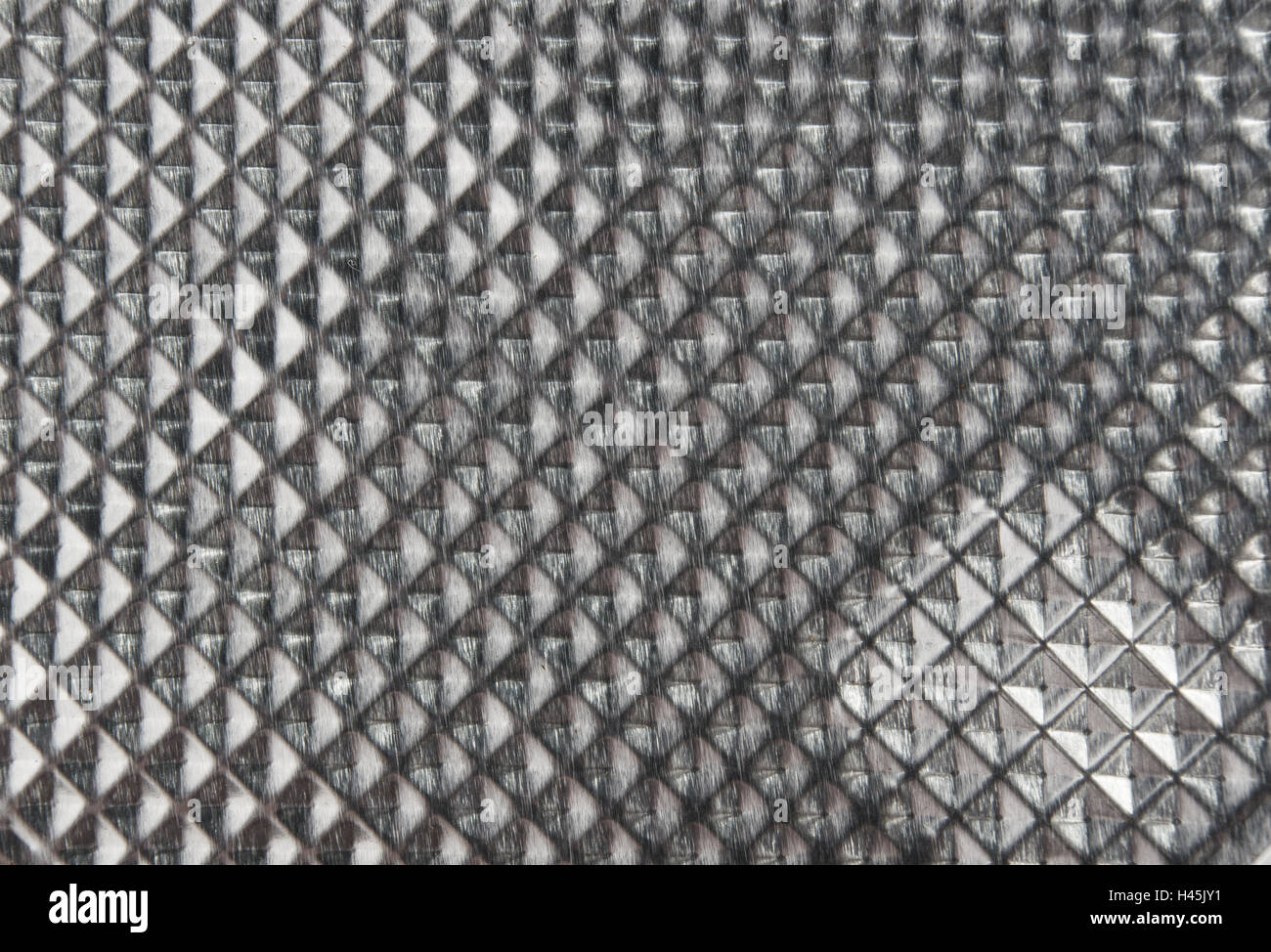 La consistenza della superficie di alluminio con cellule piramidali Foto Stock