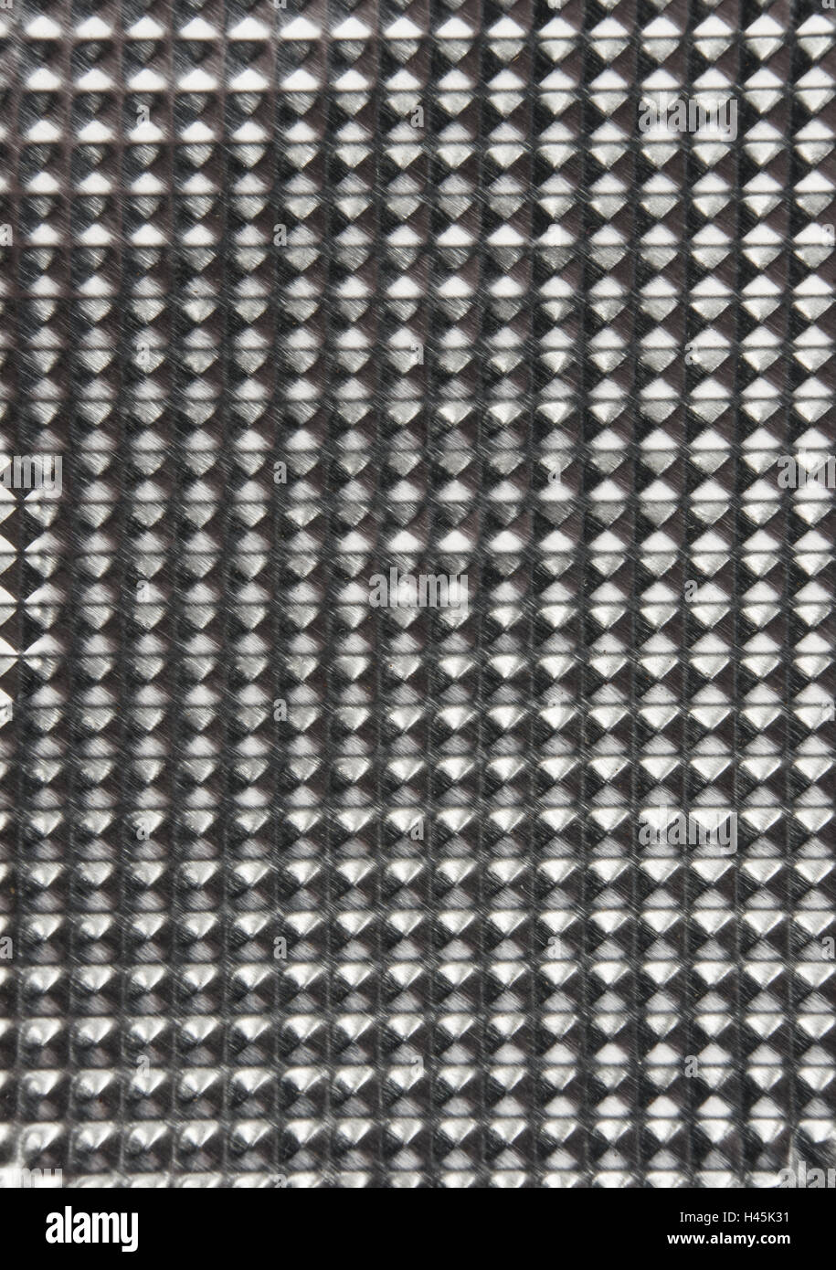 La consistenza della superficie di alluminio con cellule piramidali Foto Stock