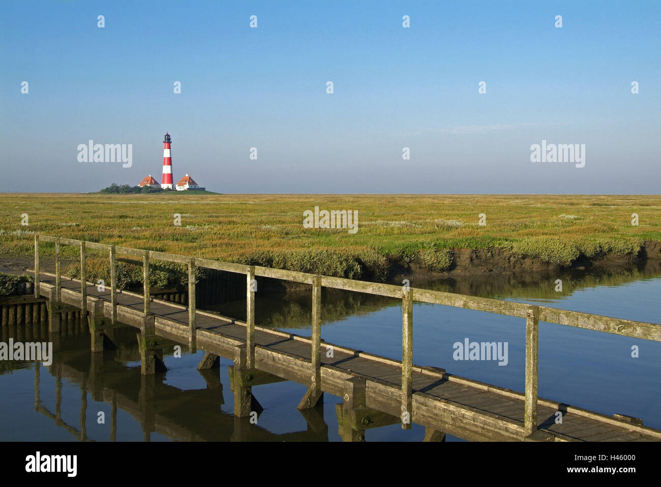 Germania, SCHLESWIG-HOLSTEIN, Eiderstedt, Westerhever, tideway, bridge, faro Westerheversand, Foto Stock