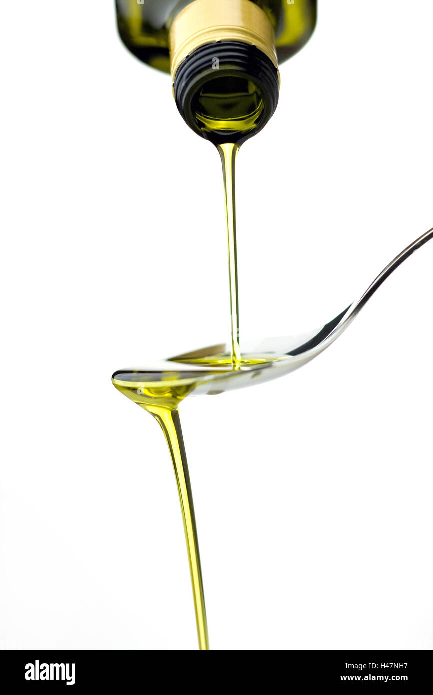 Olio di oliva versare fuori, Foto Stock