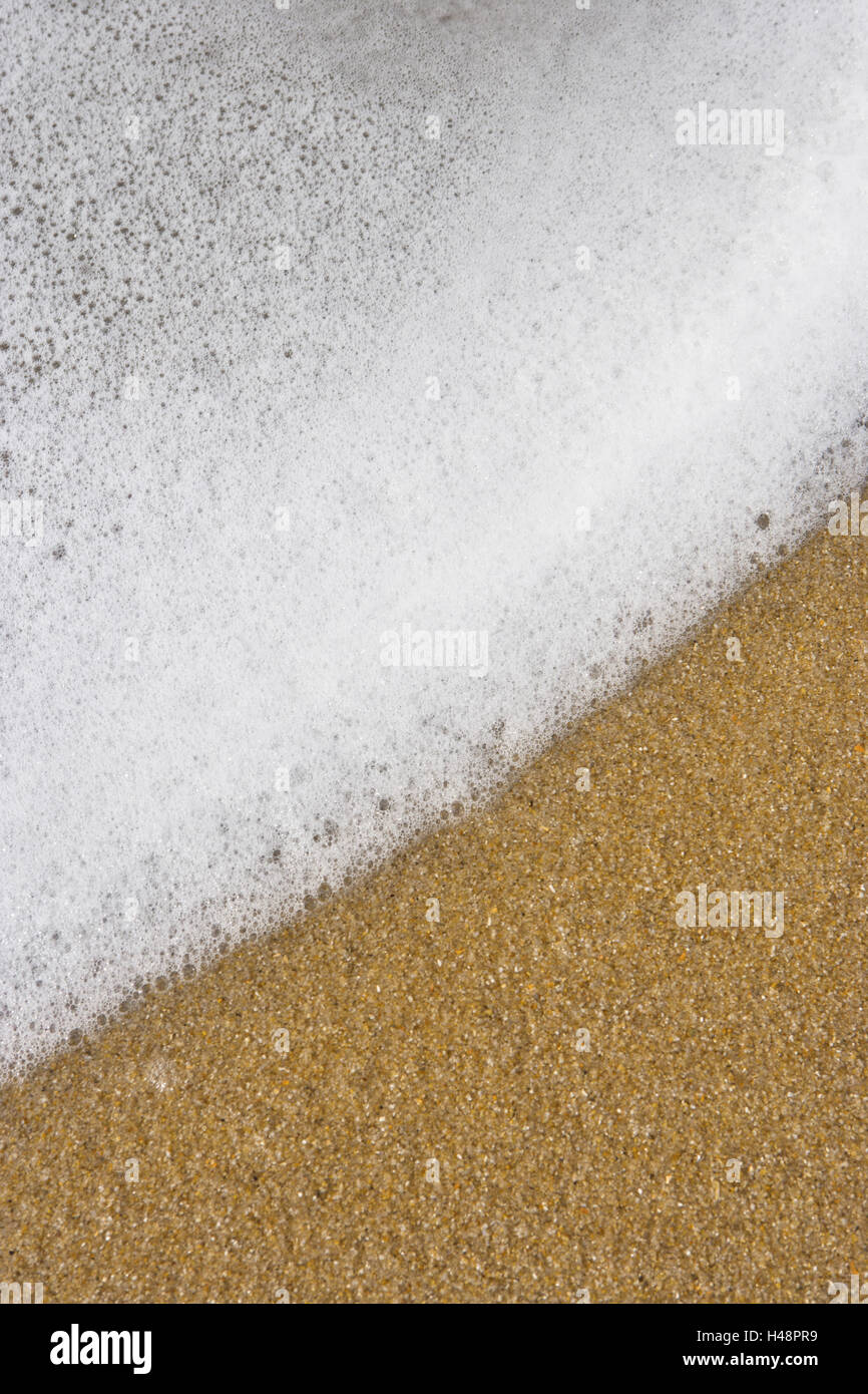 Schiuma bianca spiaggia di sabbia, Foto Stock