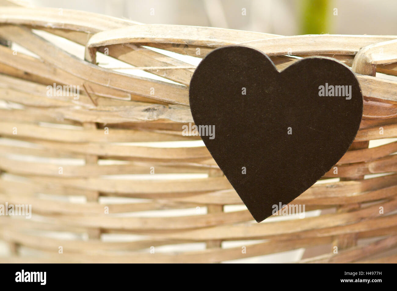 Cuore nero nel cestello, medium close-up, Foto Stock