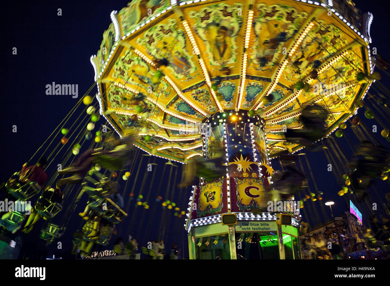 Giostra a ottobre festa a Monaco di Notte Foto Stock