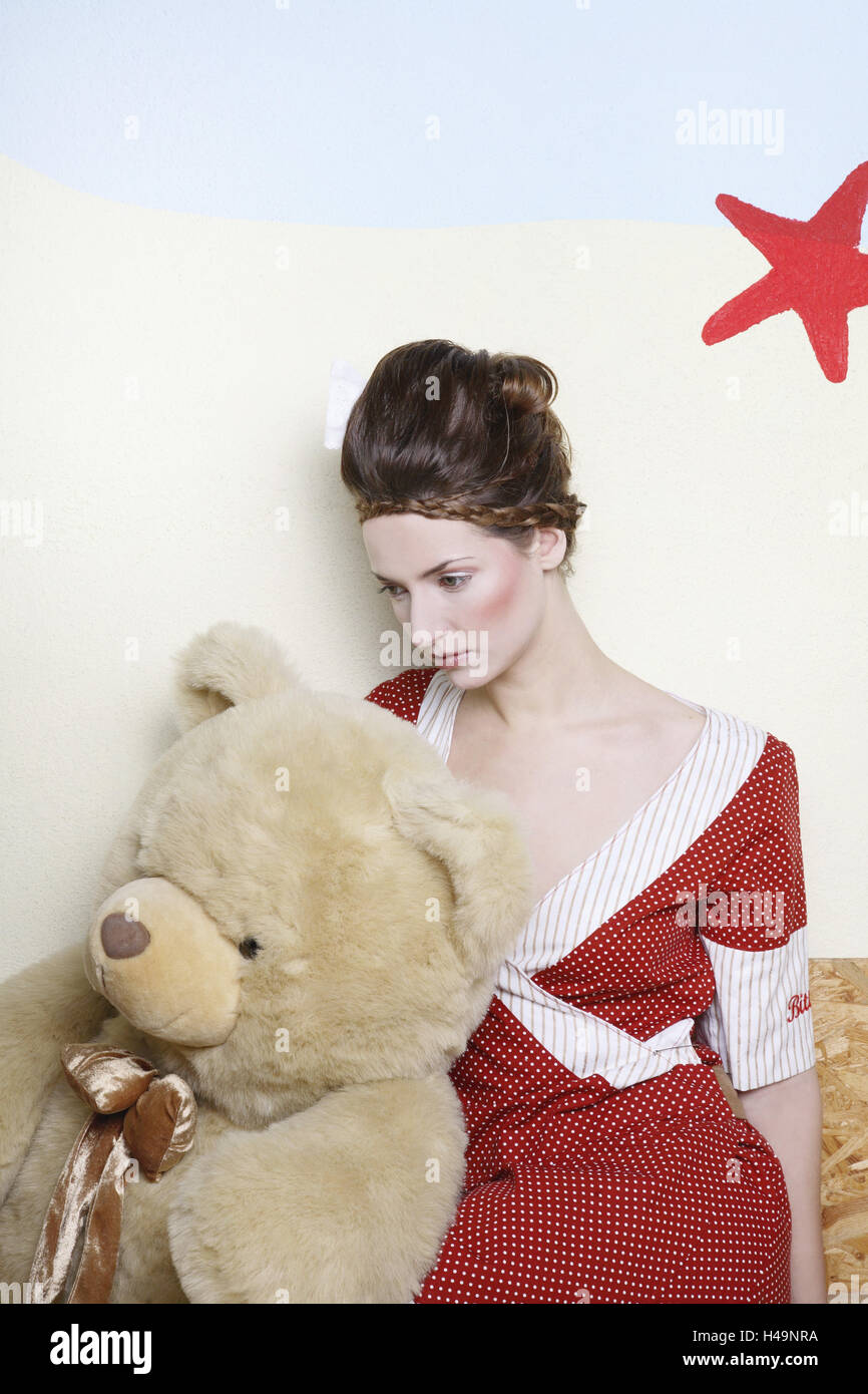 Moda shot, donna con Teddy bear, Foto Stock
