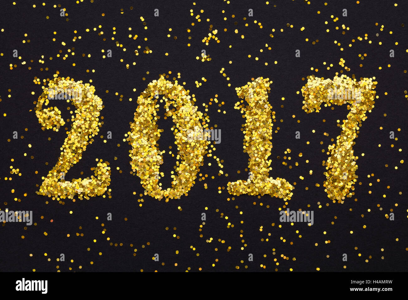 Anno nuovo decorazione,Closeup su brillantini dorati 2017 Foto Stock
