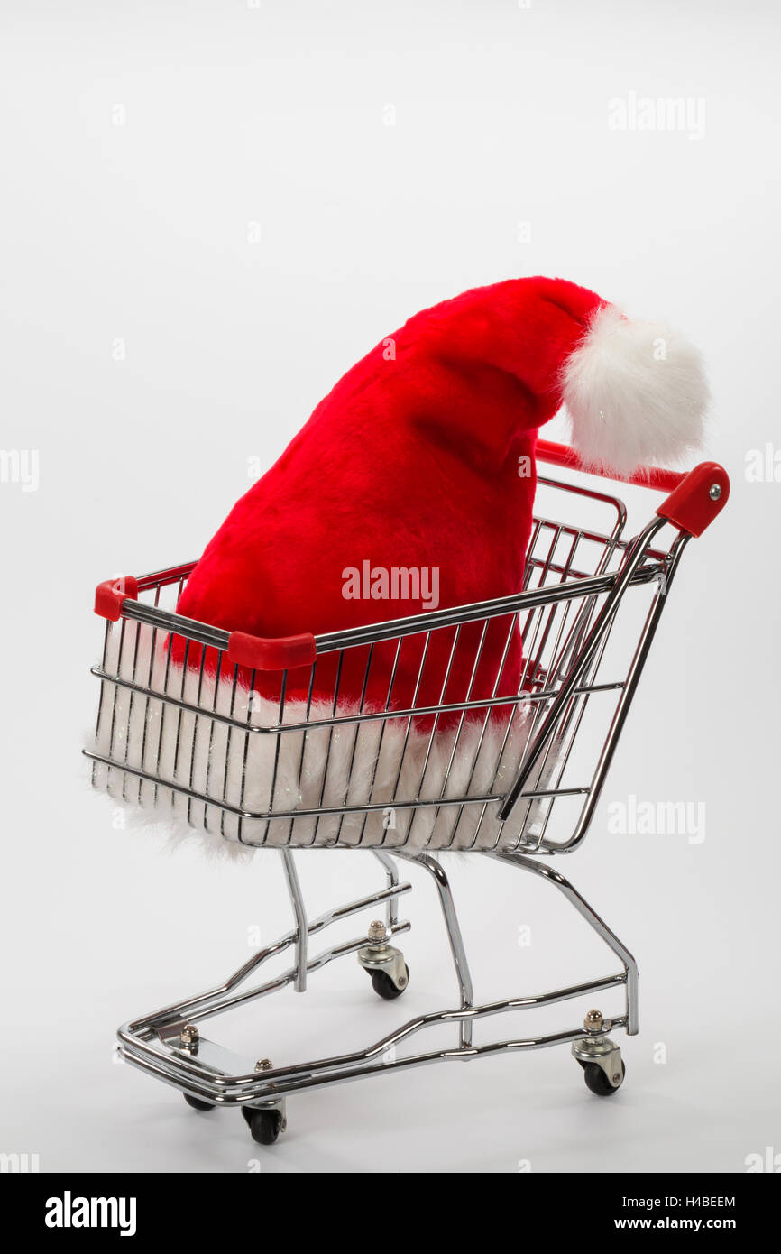 Carrello spesa, Santa hat, immagine simbolica, di acquisto, di consumo, Foto Stock