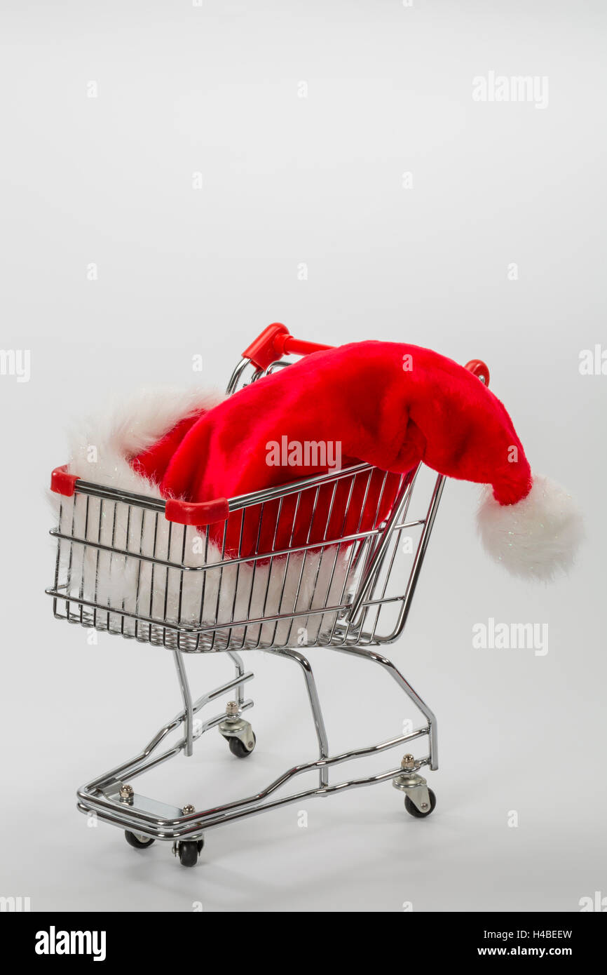 Carrello spesa, Santa hat, immagine simbolica, di acquisto, di consumo, Foto Stock