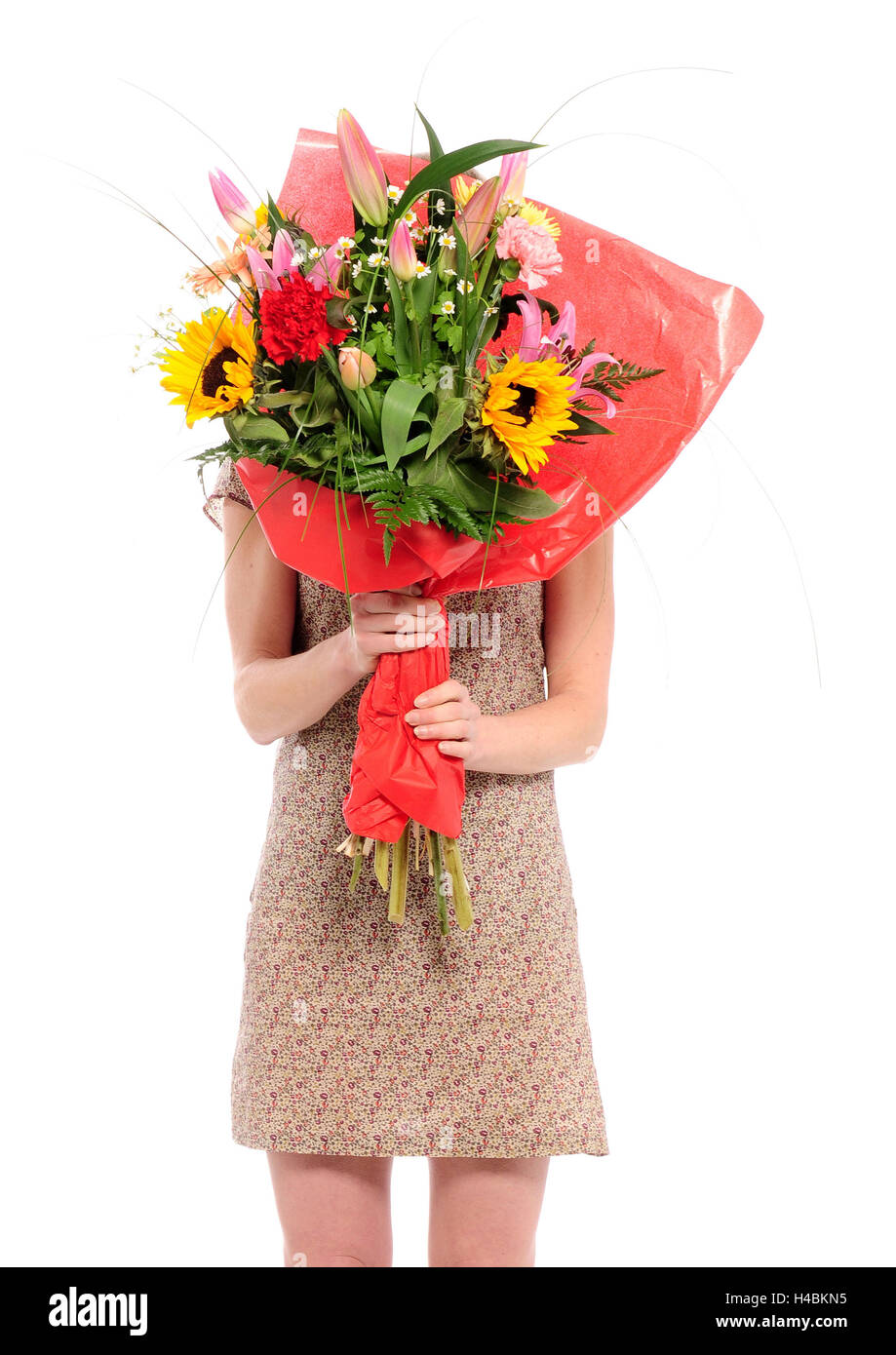 Donna con bouquet di fronte il suo volto, Foto Stock Donna con bouquet di fronte il suo volto, Foto Stock