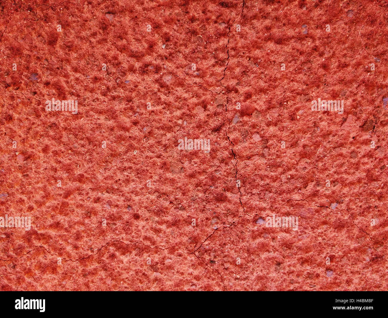 Closeup colpo di rosso marrone la tessitura del suolo sullo sfondo Foto Stock