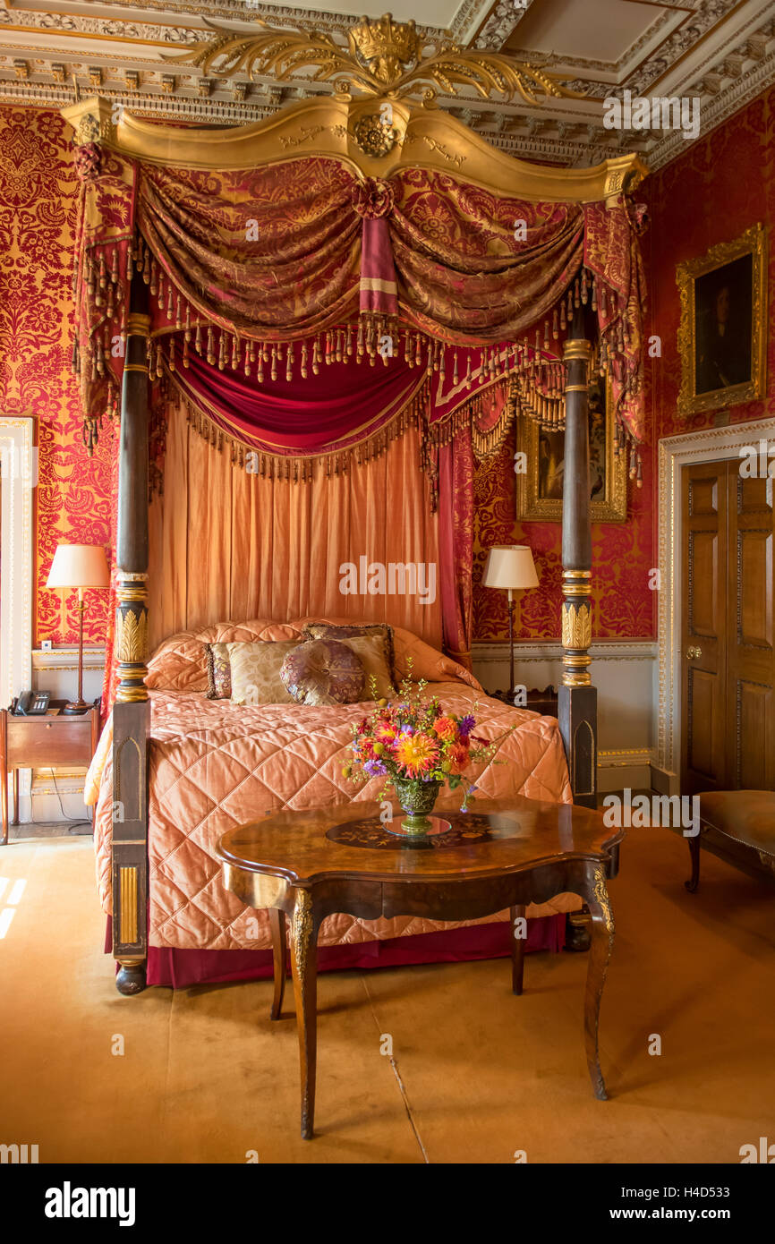 Camera rossa in Holkham Hall, Pozzi-next-Mare, Norfolk, Inghilterra Foto Stock