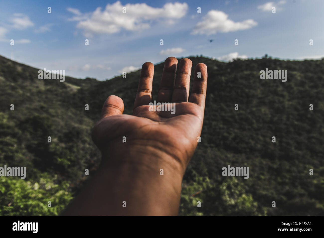 Il mondo è a portata di mano Foto Stock