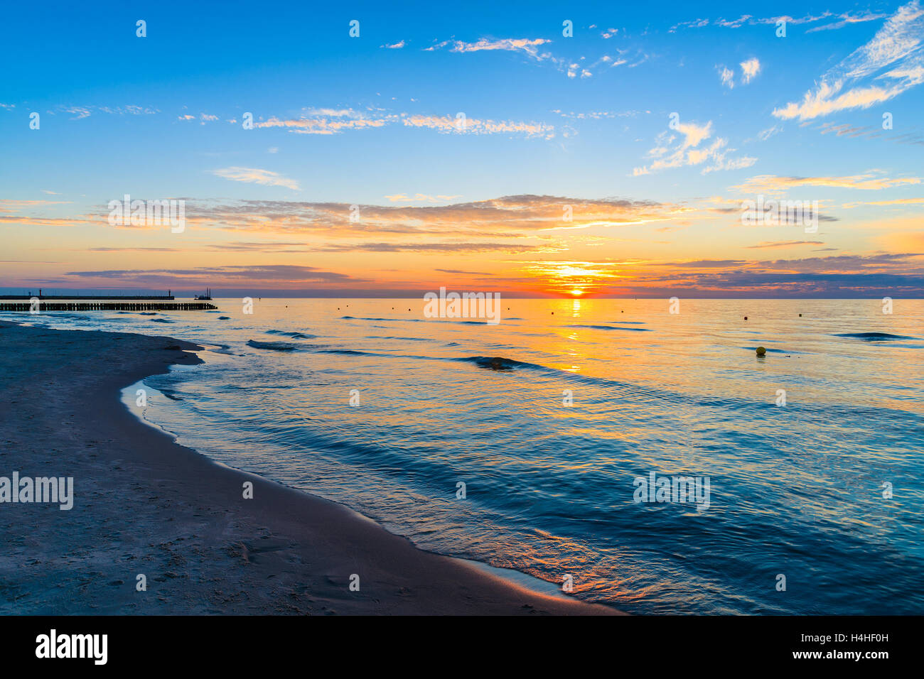 Tramonto sulla spiaggia in Leba, Mar Baltico, Polonia Foto Stock