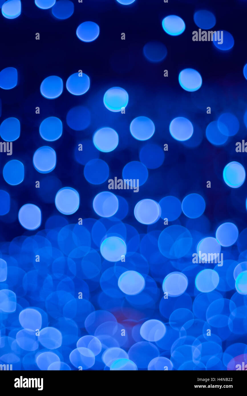 Vacanze di Natale di sfondo sfocato scintillanti luci blu Foto Stock