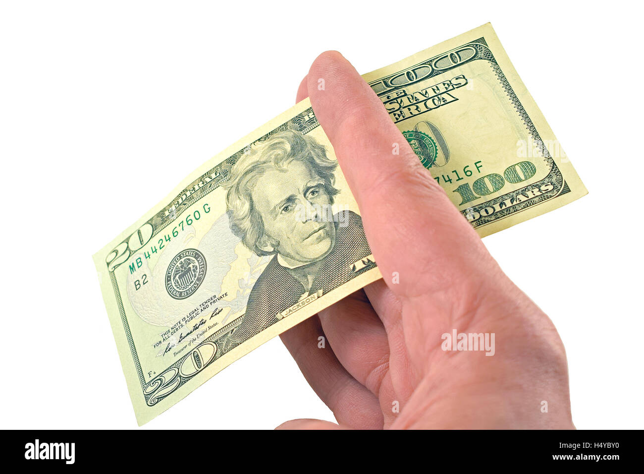 Fare profitto. Venti dollari le modifiche a un centinaio di dollari tra le dita. Foto Stock