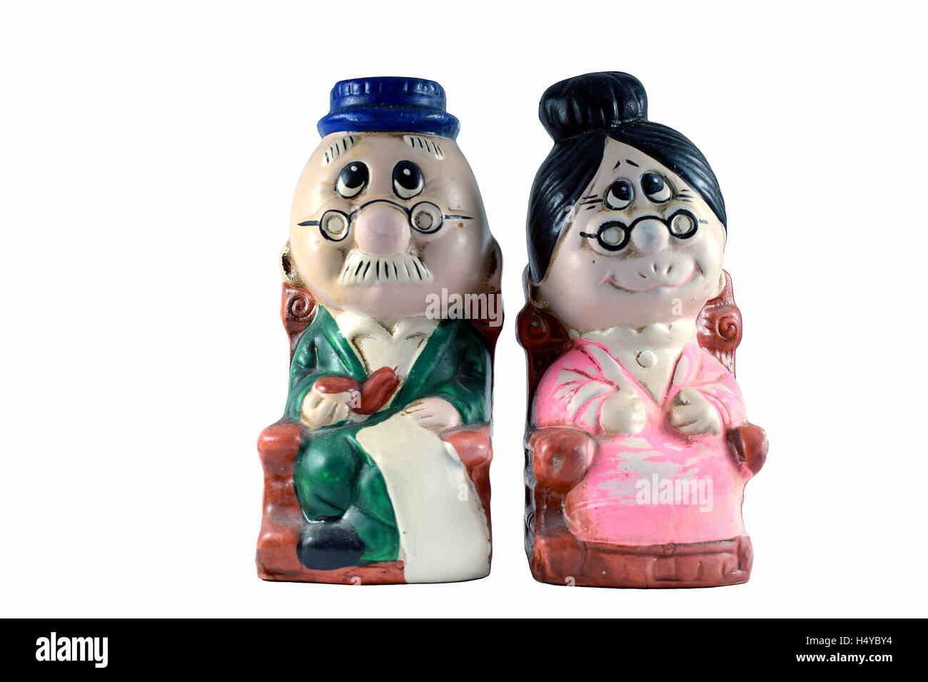 Invecchiare insieme. Le figure della vecchia coppia sedersi vicino all'altra. Foto Stock