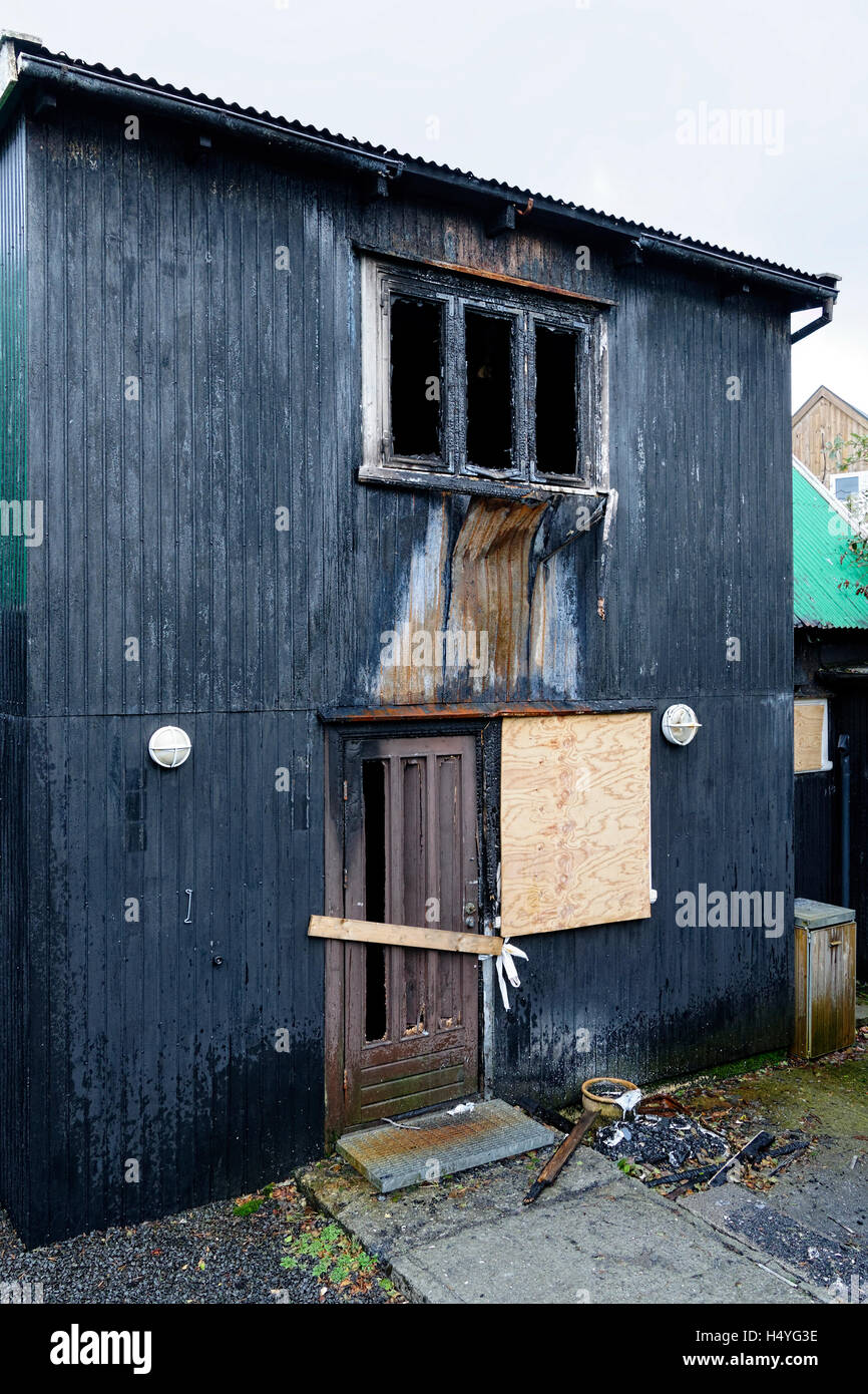 Fuoco bruciato edificio danneggiato,Torshavn, Streymoy, Isole Faerøer, Atlantico del Nord, Europa Foto Stock
