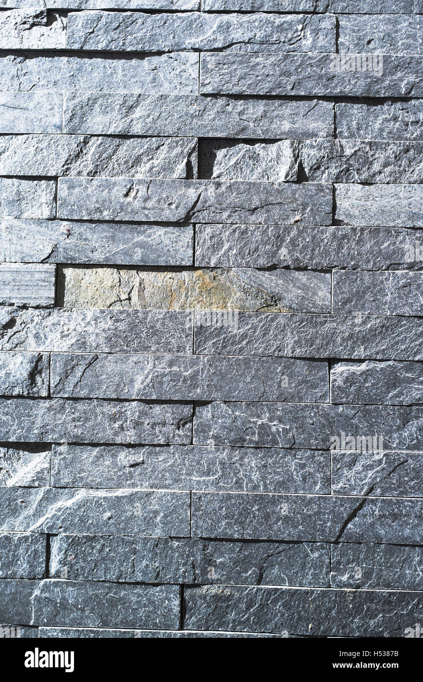 Dh muro di mattoni di pietra grigia di tessitura tessitura della pietra sfondo grigio close up Foto Stock