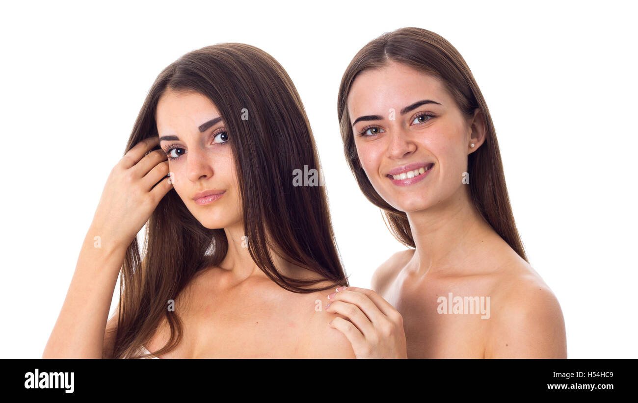 Due giovani donna con capelli lunghi in studio Foto Stock