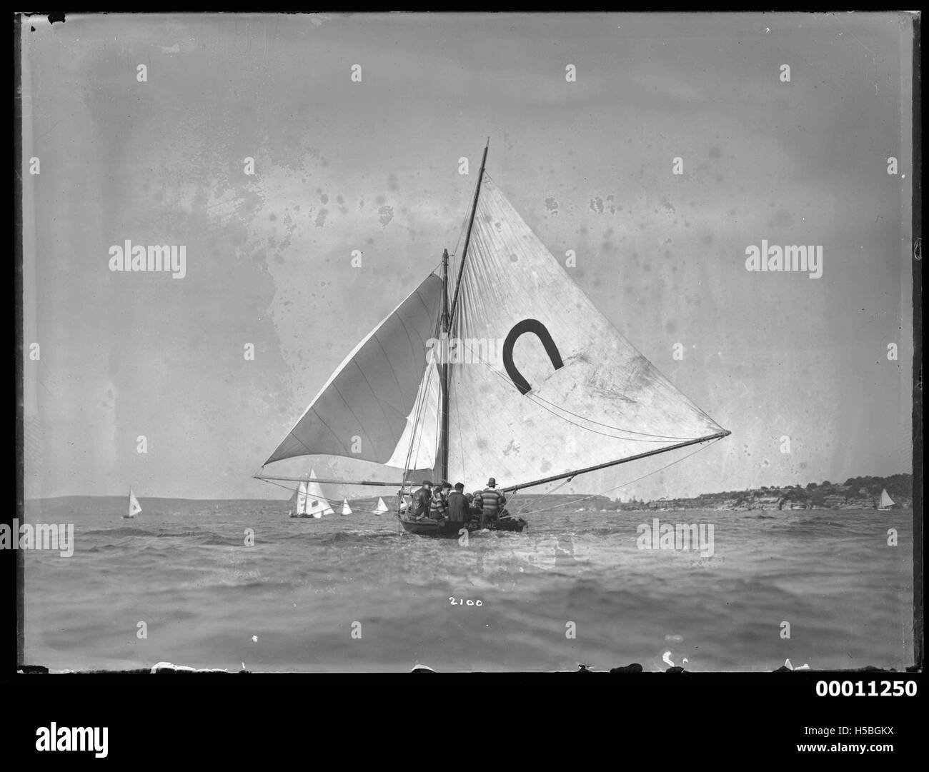 Il PASSATEMPO di 18 piedi è un notevole yacht da corsa sul porto di Sydney, che rappresenta la tradizione della nautica da diporto nella zona. Partecipa a gare nazionali di yacht e fa parte del patrimonio velico di Sydney. Foto Stock