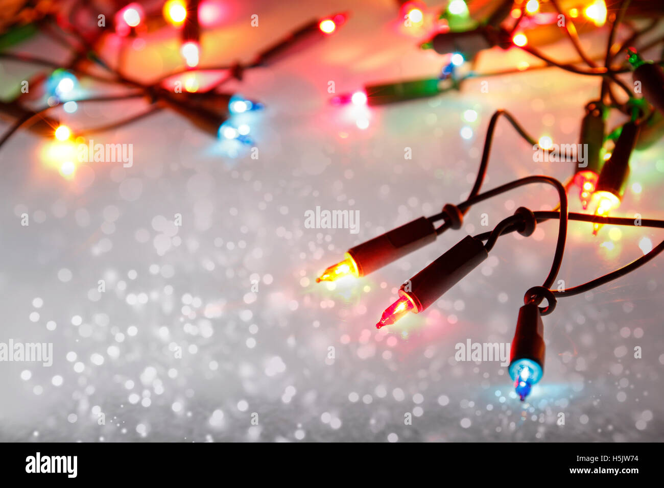 Primo piano di luci di Natale incandescente Foto Stock