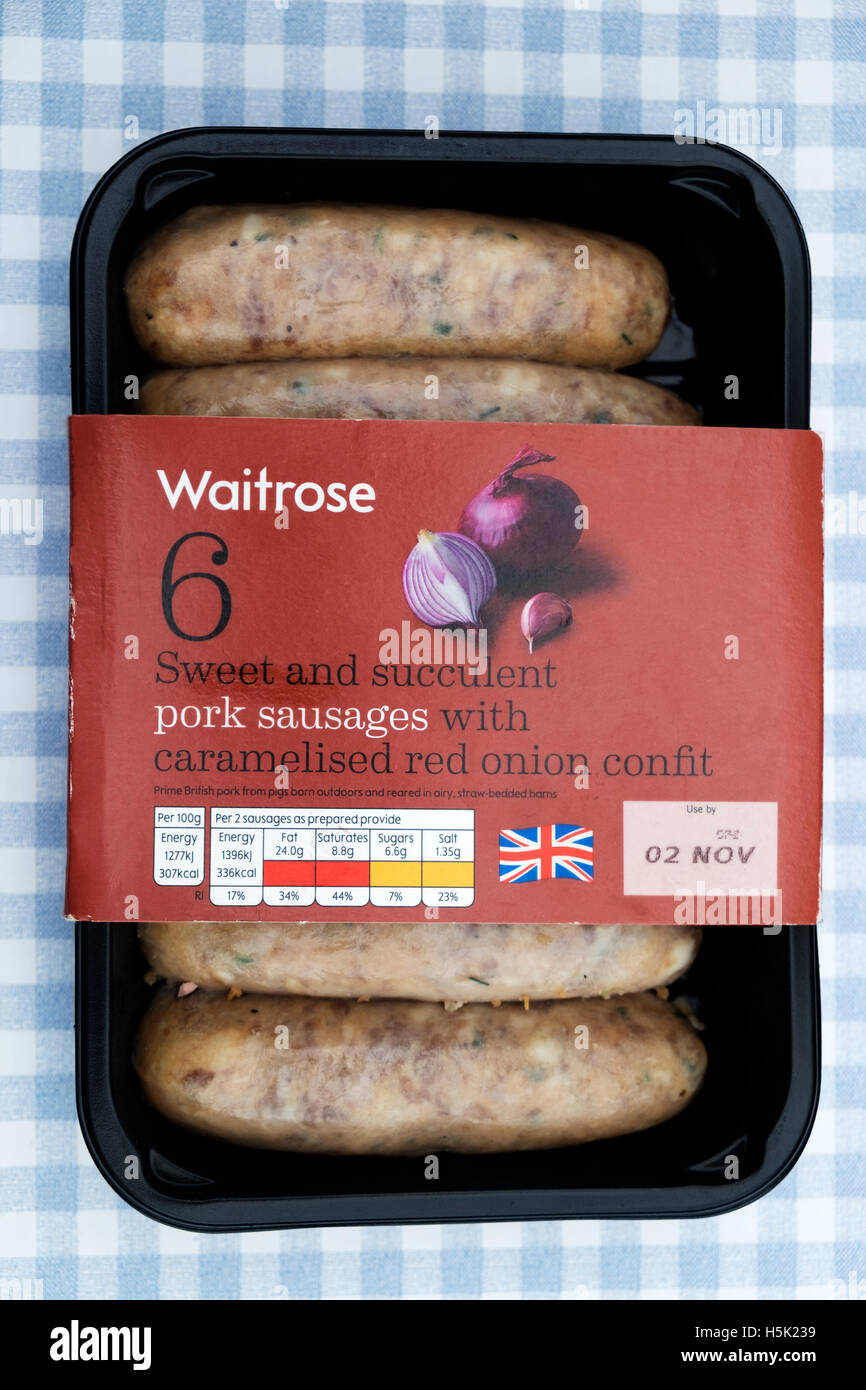 Waitrose salsicce di maiale con caramellizzato rossi confit di cipolla Foto Stock