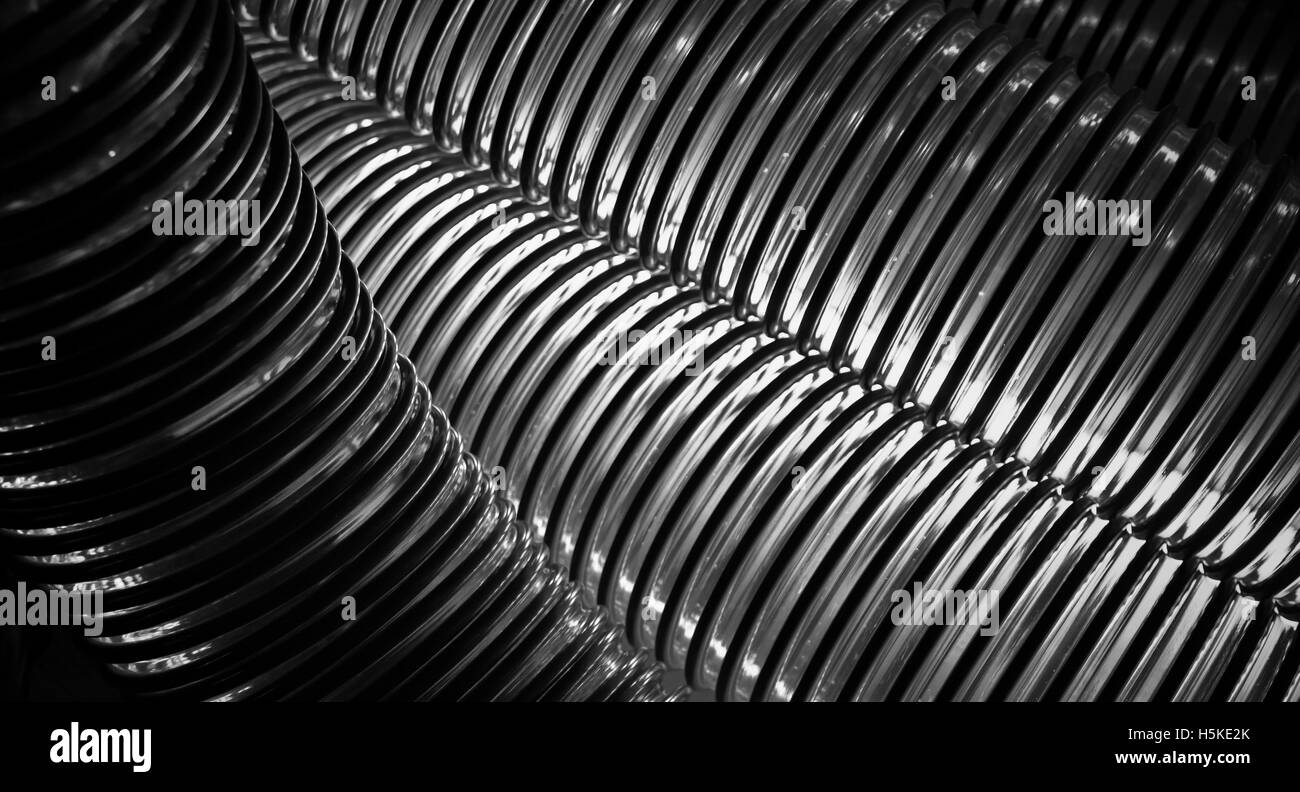 Nero industriale e tubo bianco close-up sullo sfondo Foto Stock