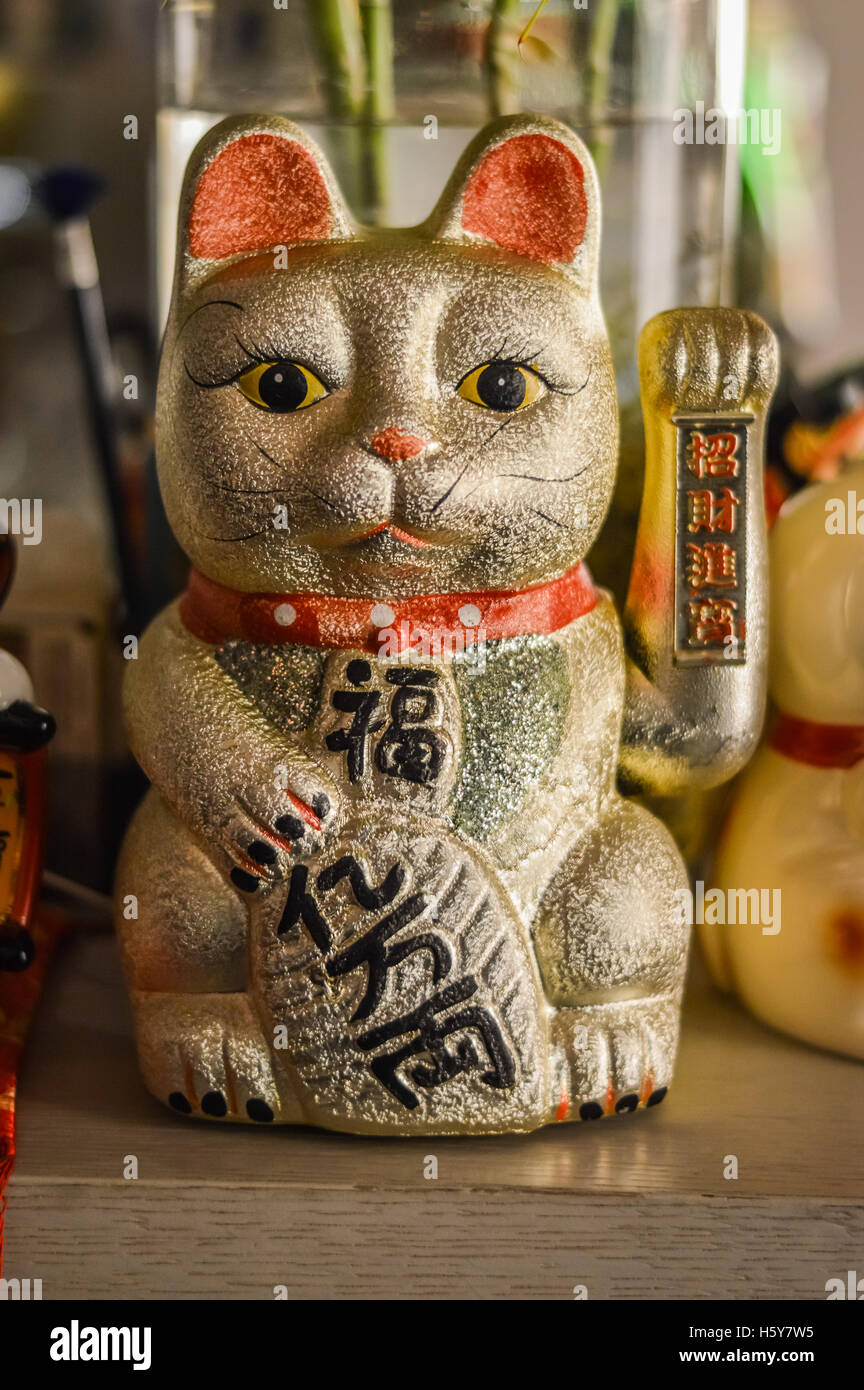 Golden Lucky Cat - Maneki Neko Foto Stock