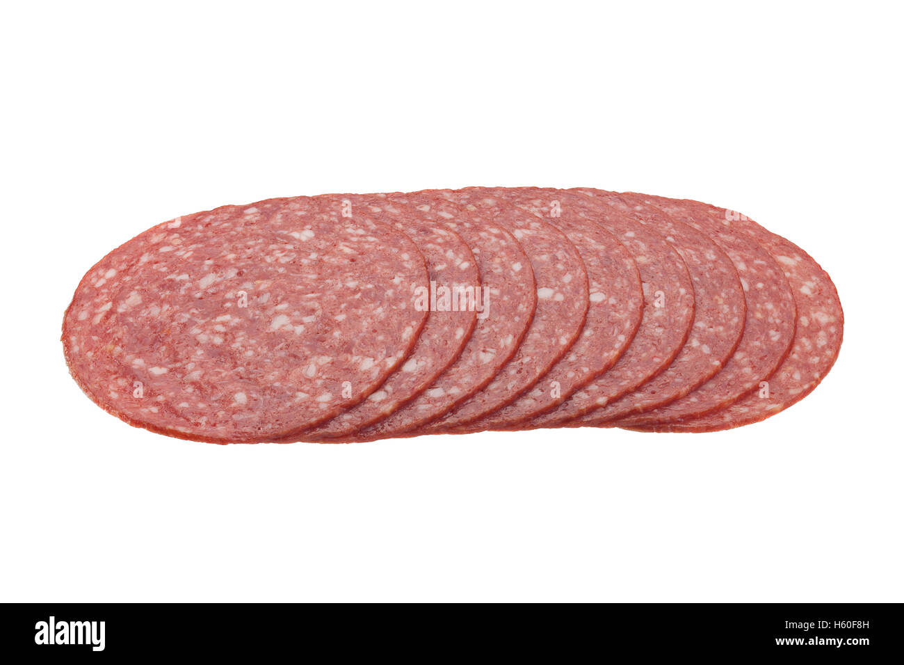 Salame, fetta closeup isolati su sfondo bianco Foto Stock