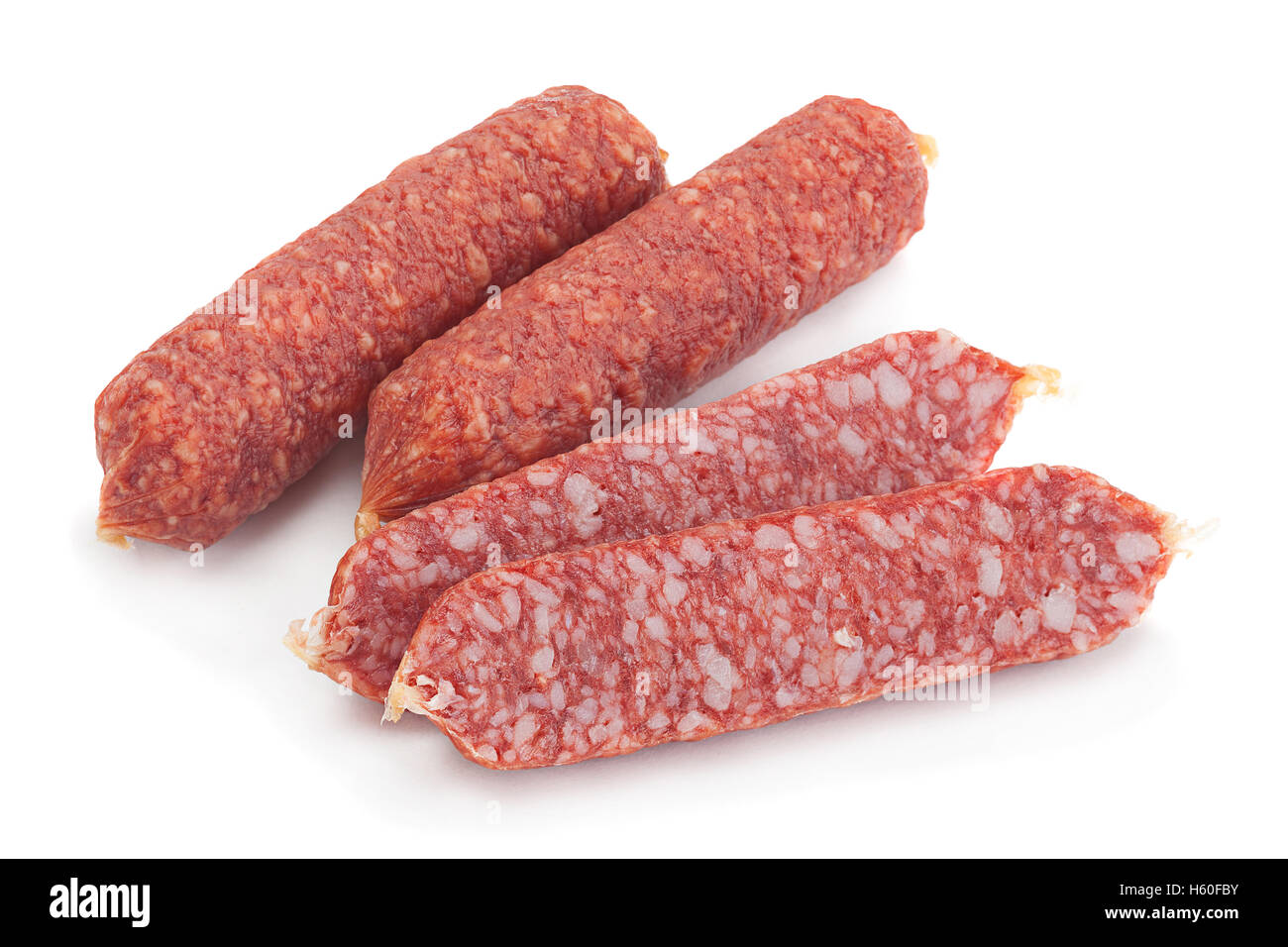 Piccolo salame, loseup isolati su sfondo bianco Foto Stock