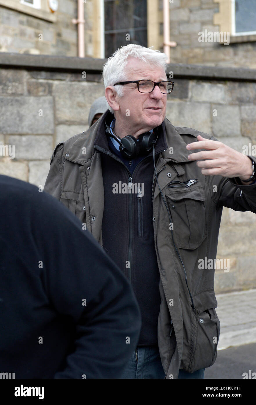 Irish Film di regista e produttore Tom Collins sul set di un film di penitenza a Londonderry. Foto Stock