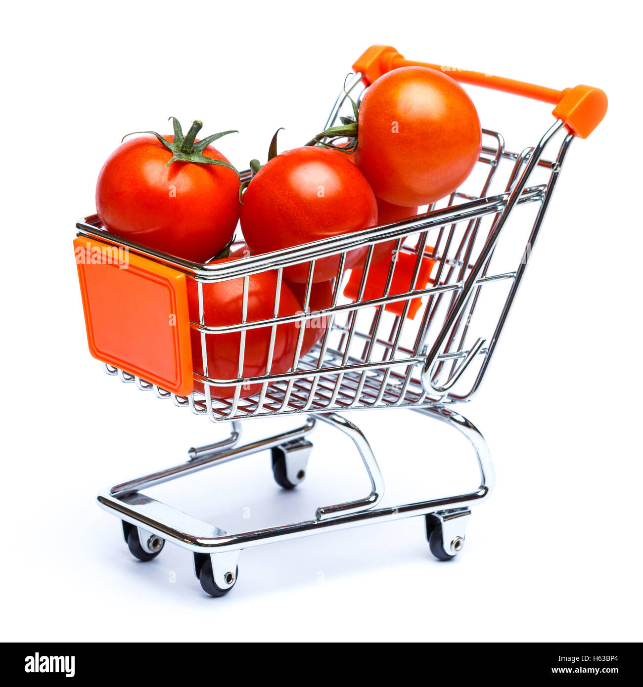 Mini carrello pieno con pomodori ciliegia Foto Stock