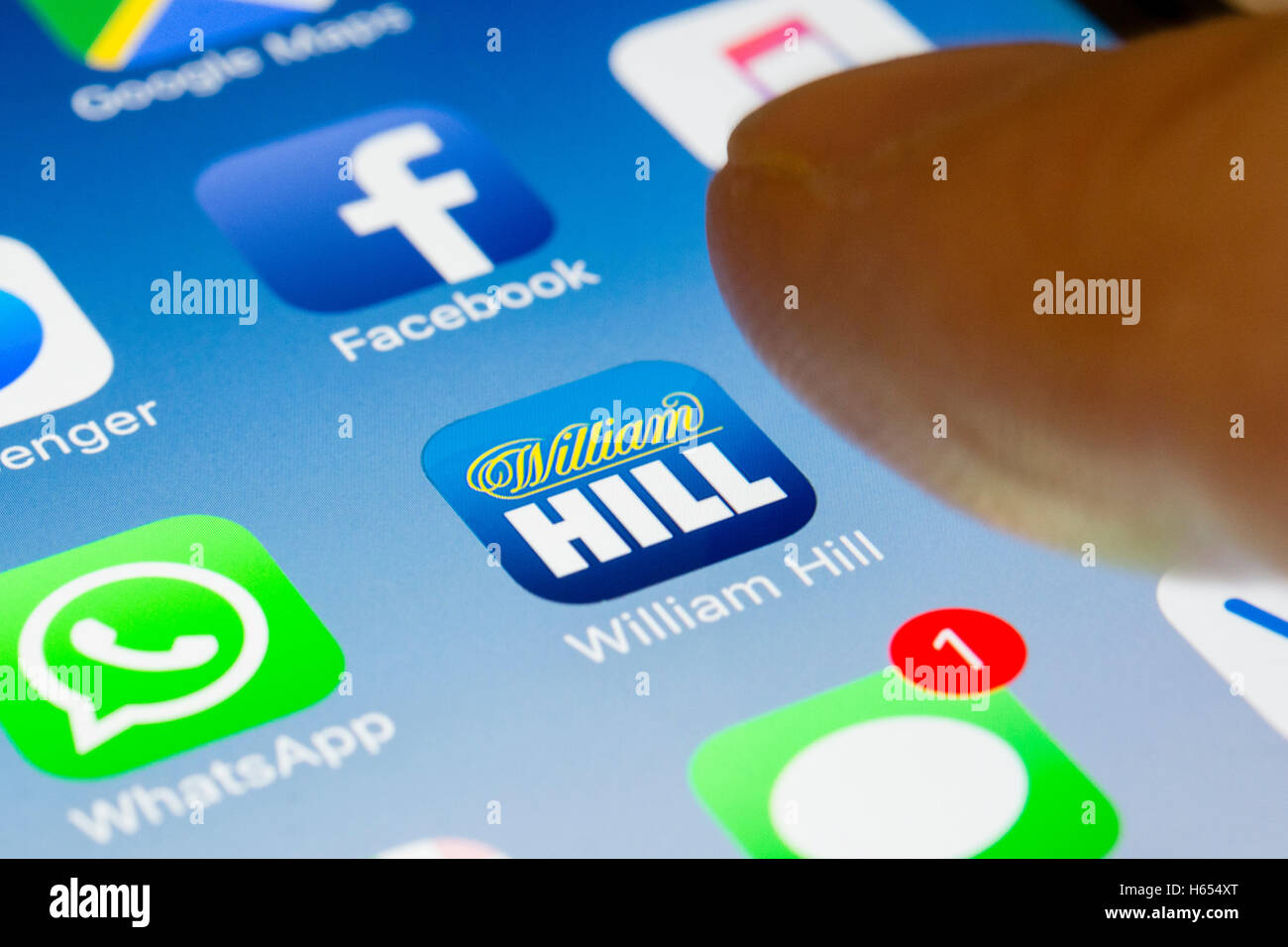 William Hill Scommesse online chiudere app su iPhone smart schermata telefono Foto Stock