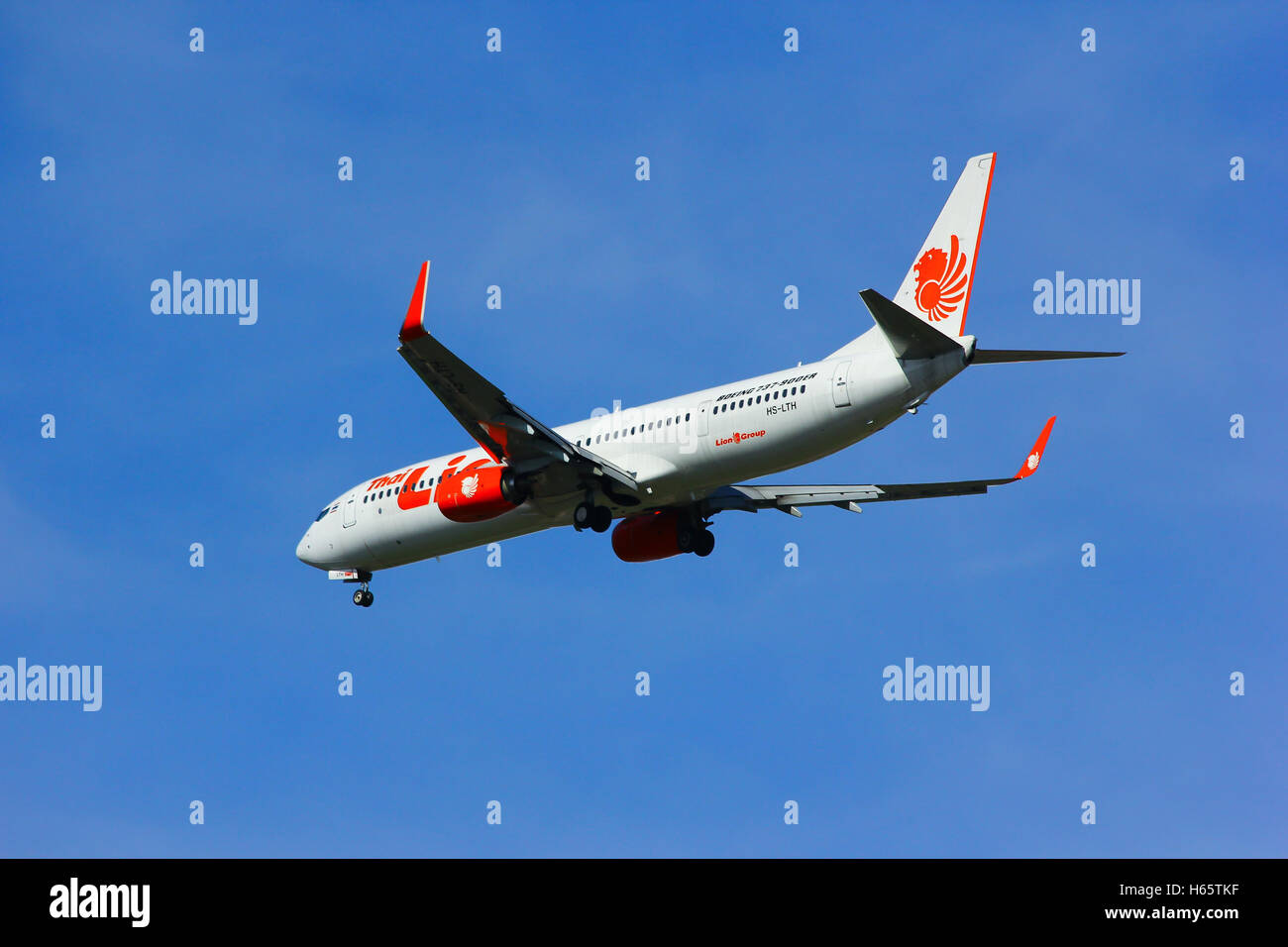 Boeing 737-900ER di Thai lion air compagnia aerea , lo sbarco di Chiangmai airport Foto Stock