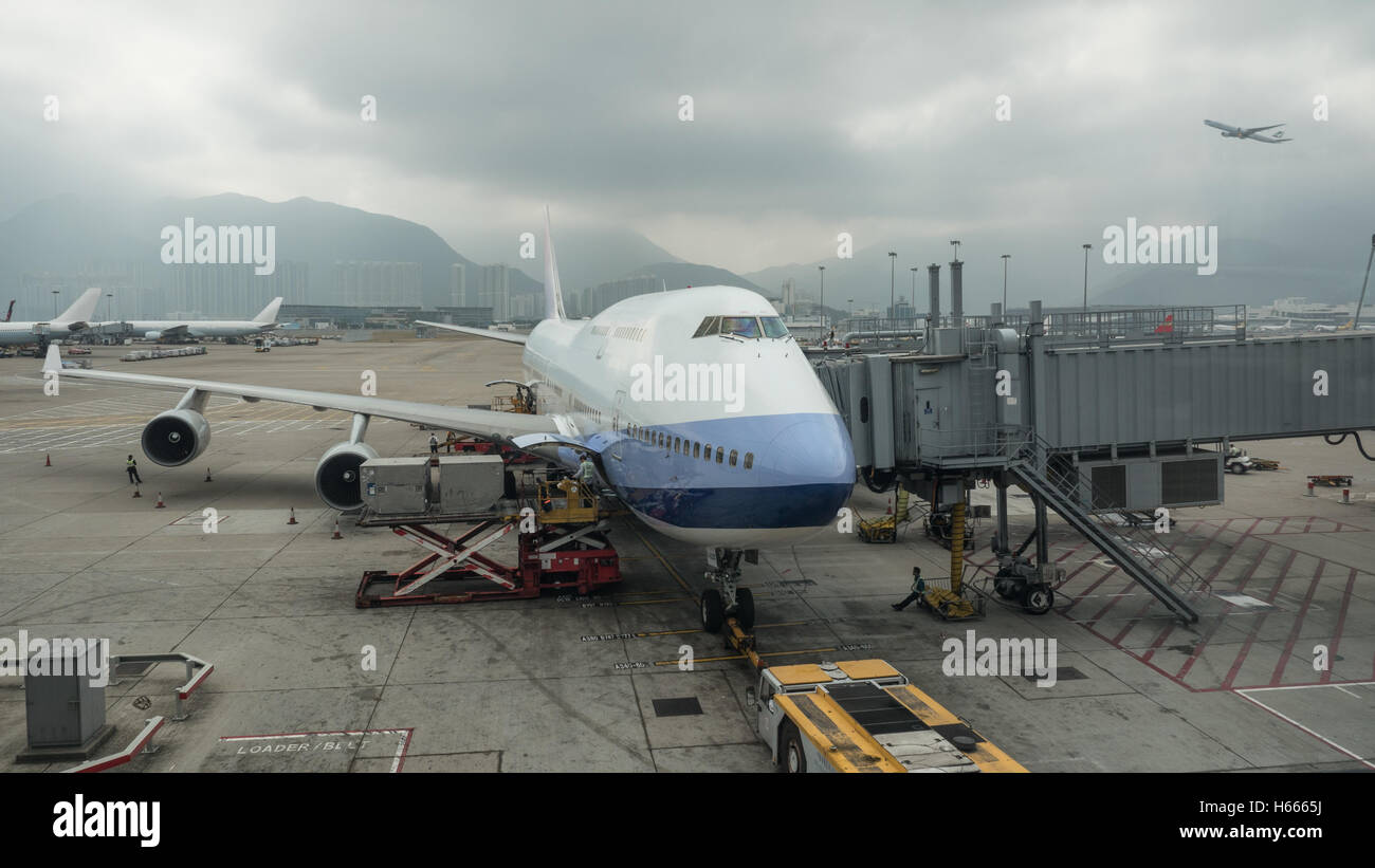 Carico di carico nel piano, Hong Kong Foto Stock