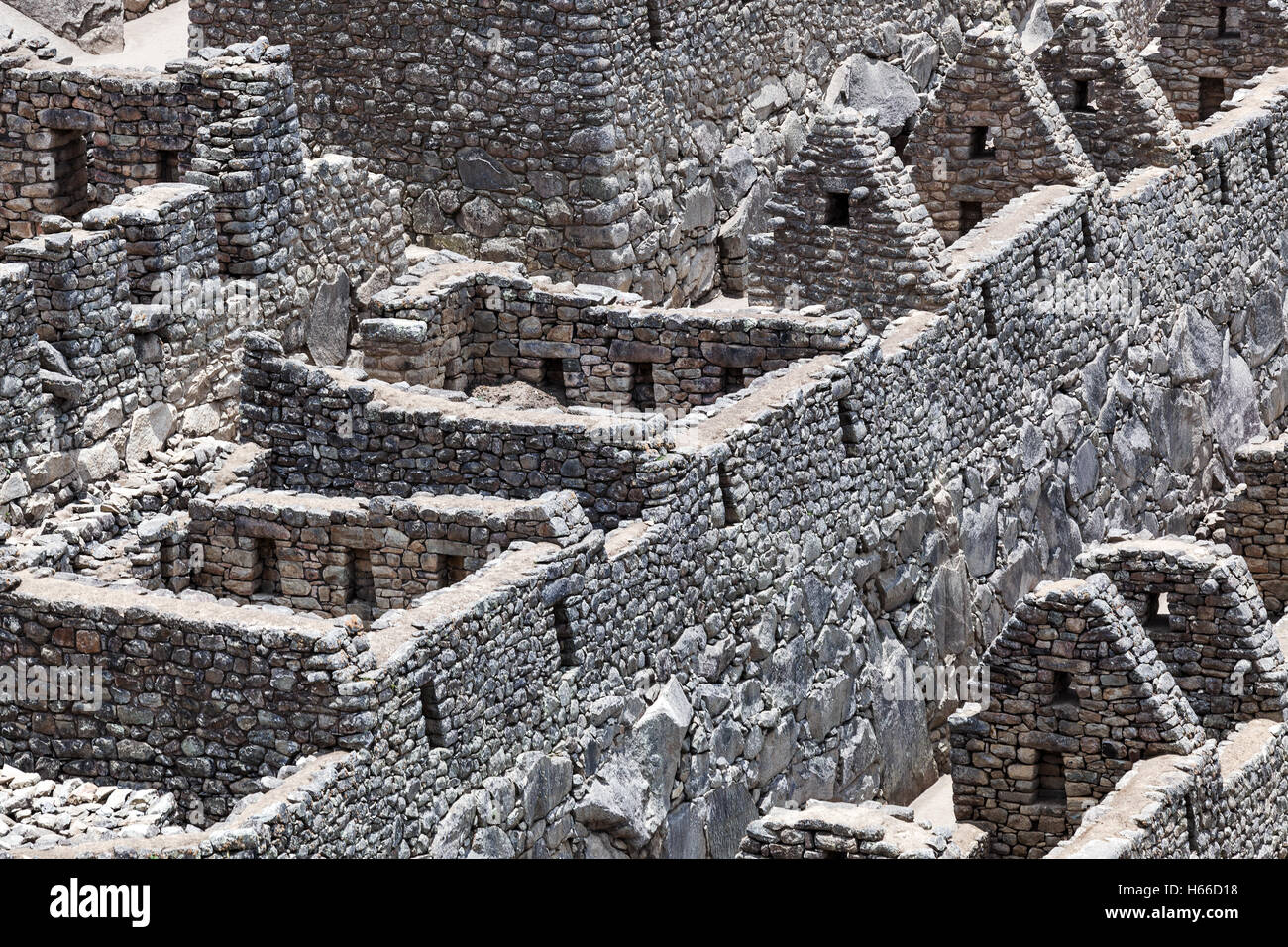 La rovina di pareti e case a Machu Picchu Foto Stock