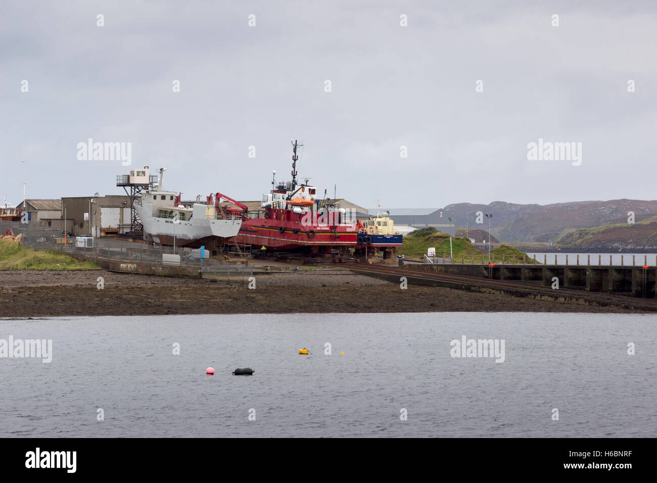 Vasto bacino di carenaggio relitto cantiere isola di Lewis Western Isles Ebridi Esterne Scotland Regno Unito Foto Stock