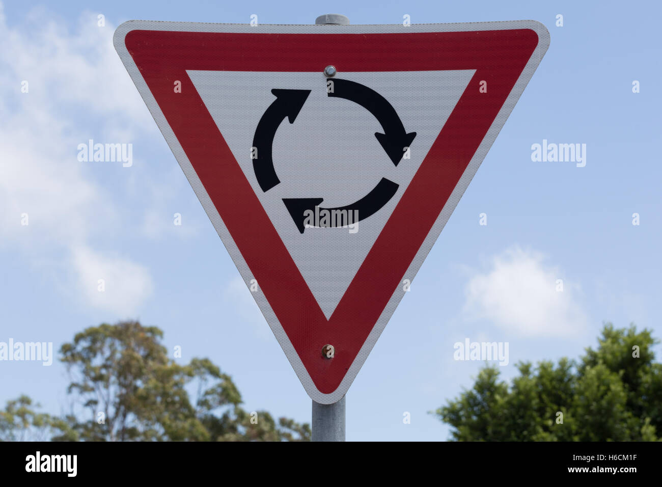 Rotatoria cartello stradale, intersezione. Foto Stock