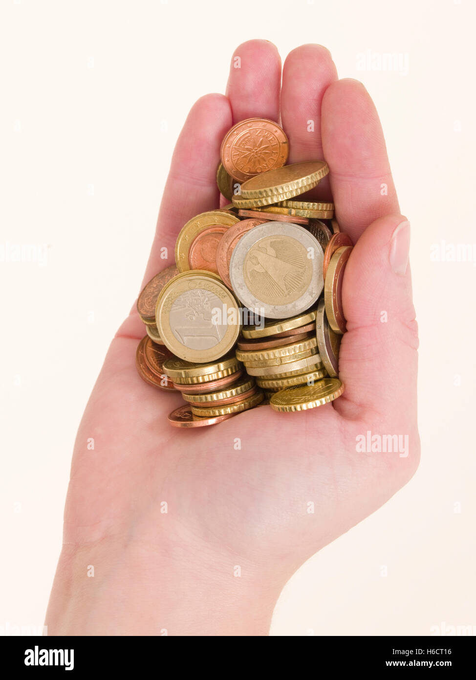 Un hadfull di denaro, risparmiare denaro Foto Stock