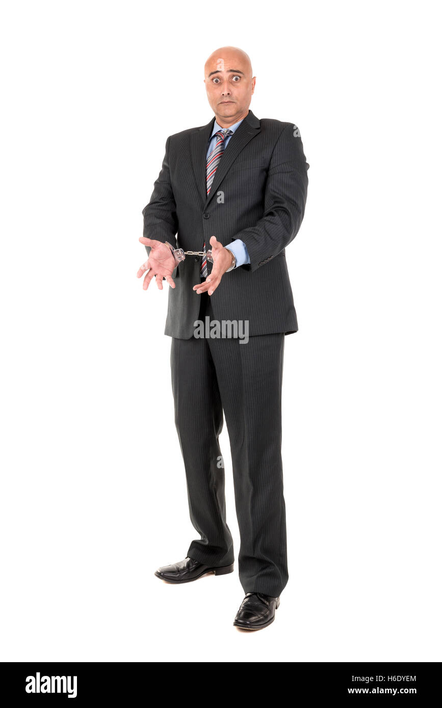 Imprenditore in manette isolato in uno sfondo bianco Foto Stock