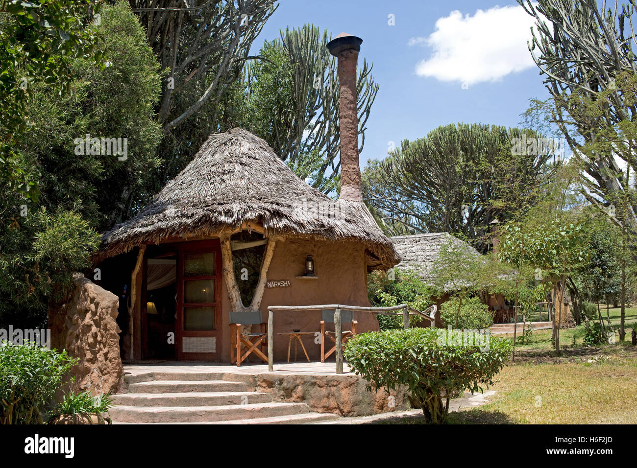 Con il tetto di paglia guest cottage presso Chui Lodge Naivasha Kenya Foto Stock