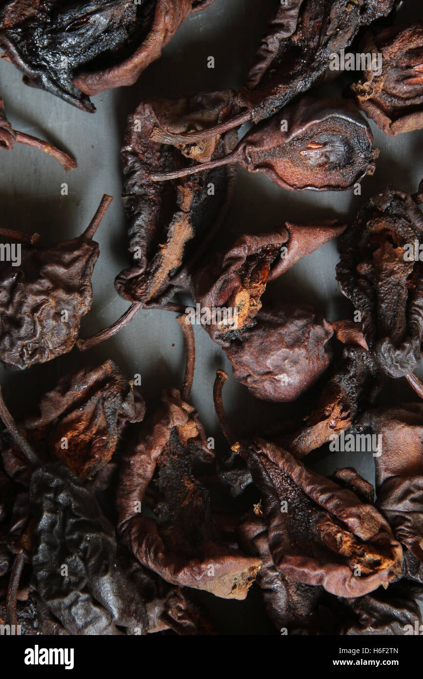 Pera secca, come ingrediente per la preparazione di bevande, cibo sullo sfondo Foto Stock