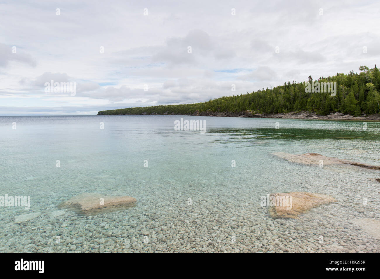 Le acque blu cristallo del mare sulla penisola di Bruce. Foto Stock